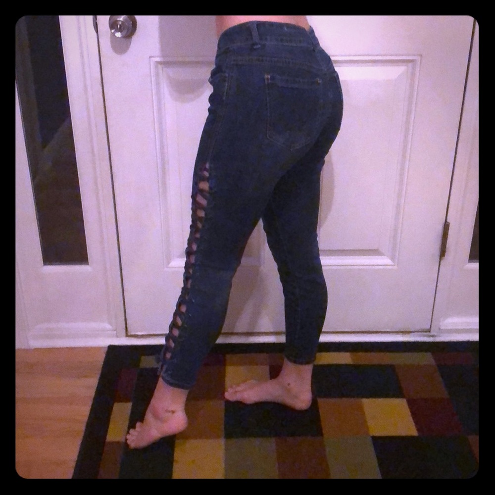 Laced up dark washed jeans